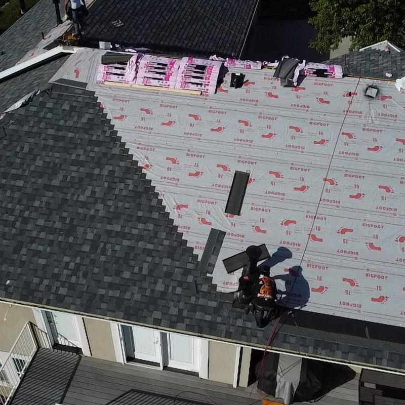 Synthetic underlayment installation on residential roof Synthetic underlayment installation on residential roof
