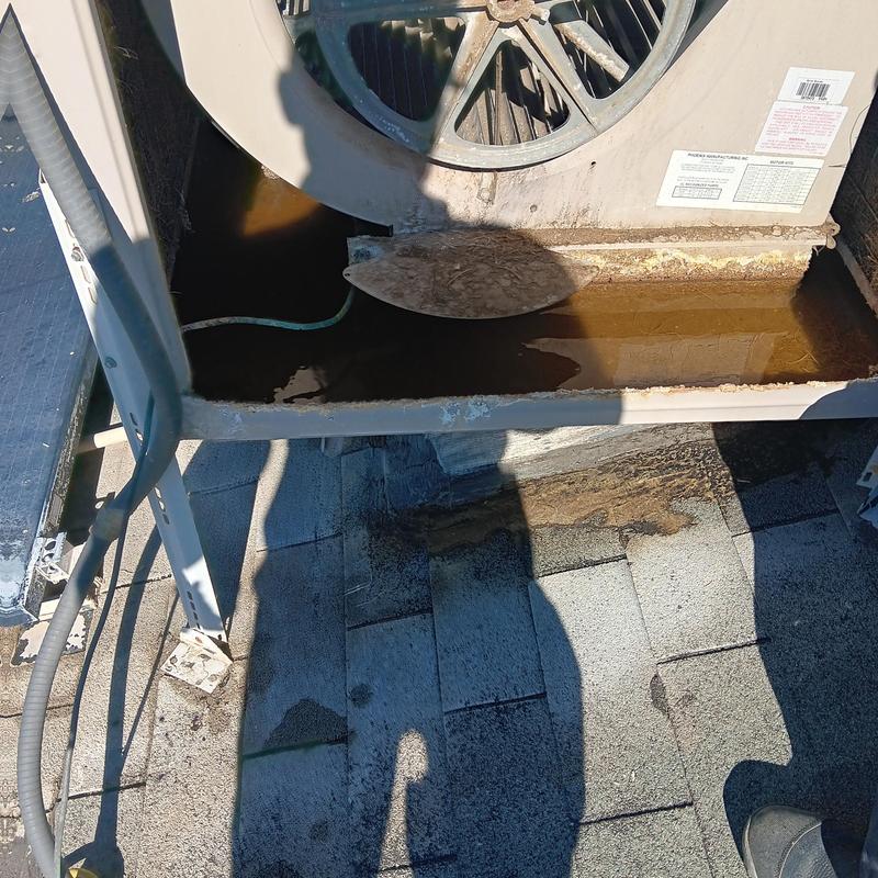 Swamp cooler with water pooling on rooftop unit