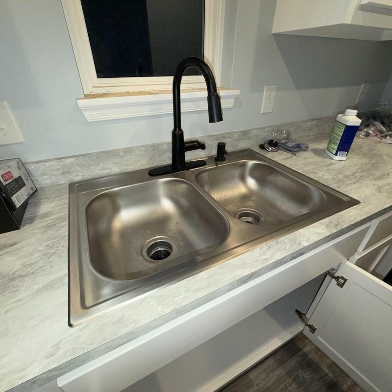 Kitchen faucet and double stainless steel sink installation Kitchen faucet and double stainless steel sink installation