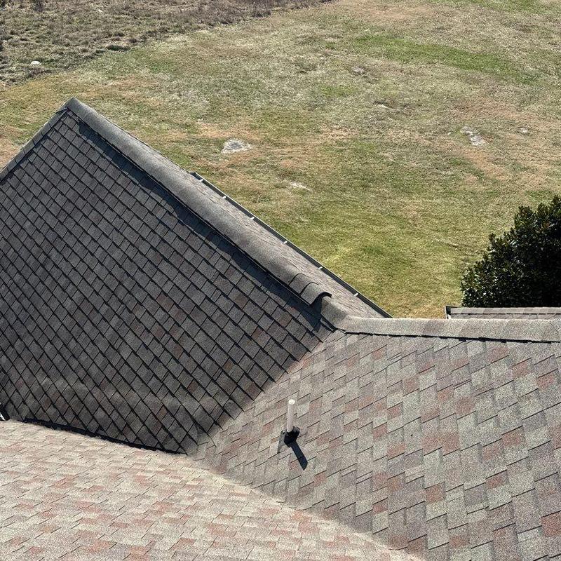 Asphalt shingle roof with hail damage inspection
