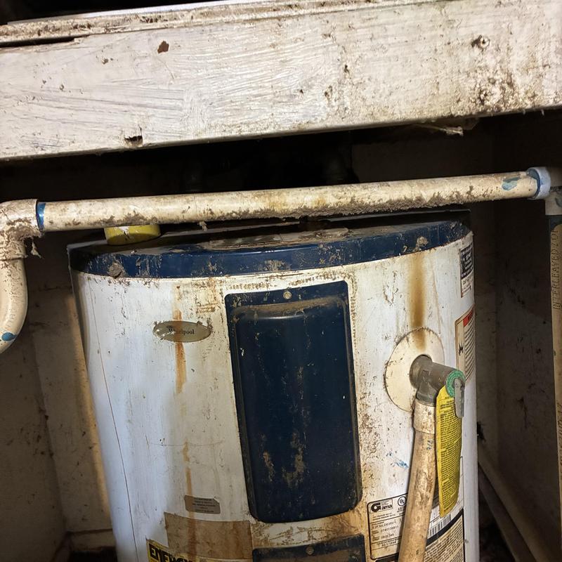 Low boy water heater with rusty supply lines