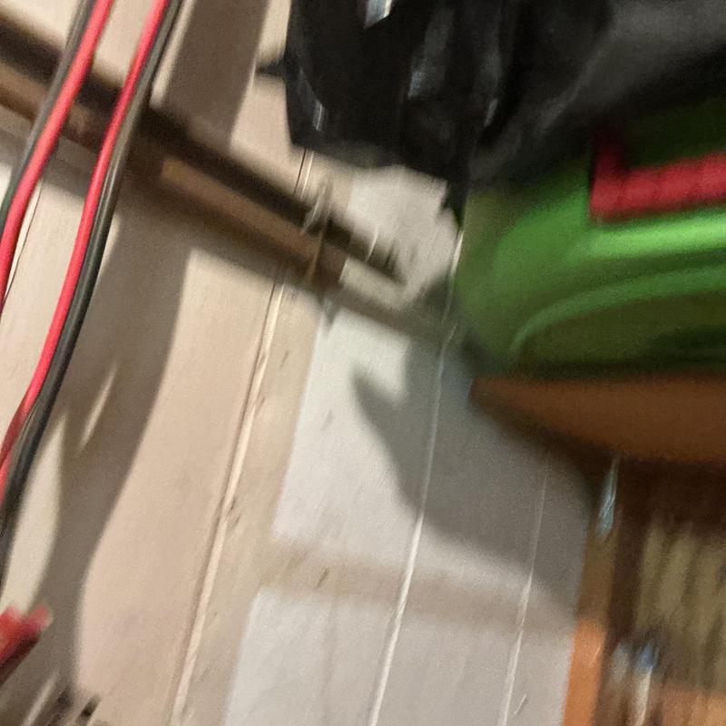 Drywall access hole cut near copper water pipes