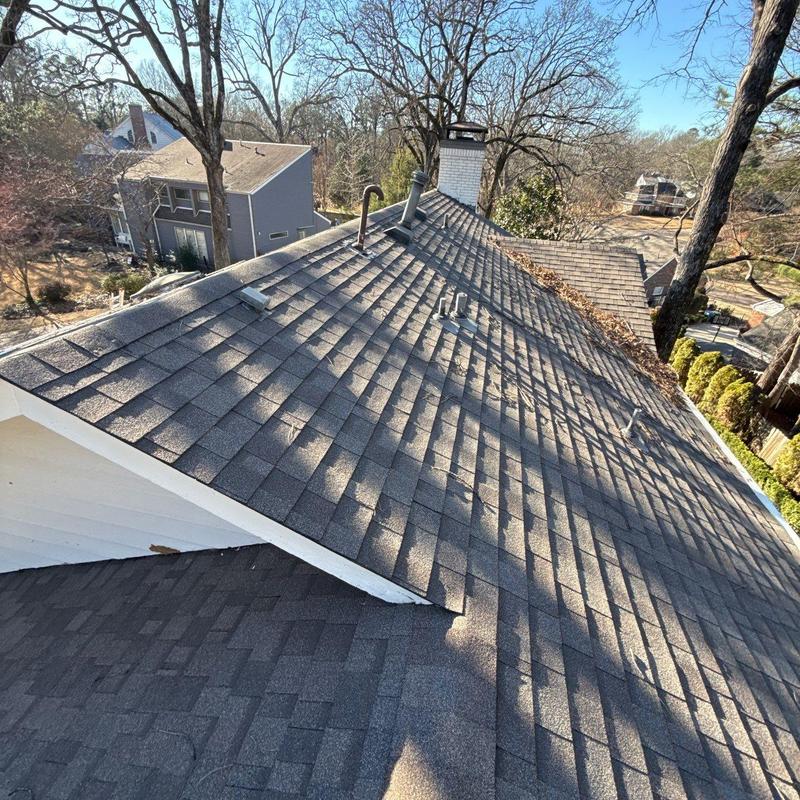 Asphalt shingle roof with vents and chimney inspection