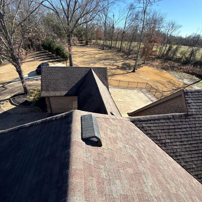 Asphalt shingle roof with ventilation and flashings inspection