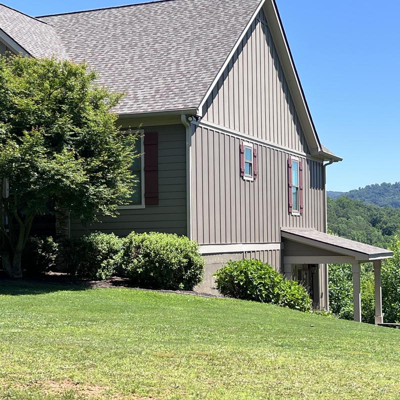 Roof replacement, gutter repair, and wood beam restoration