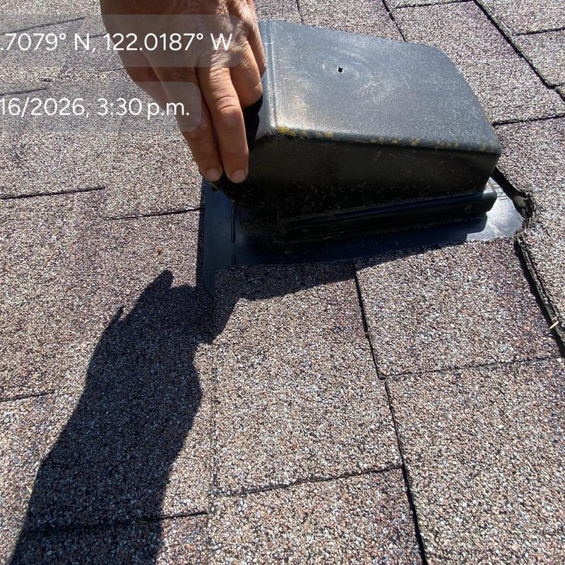 Roof vent flashing with hand inspection on asphalt shingles