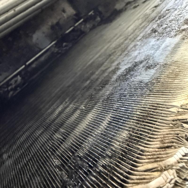 Evaporator coil heavily coated with dirt buildup Evaporator coil heavily coated with dirt buildup