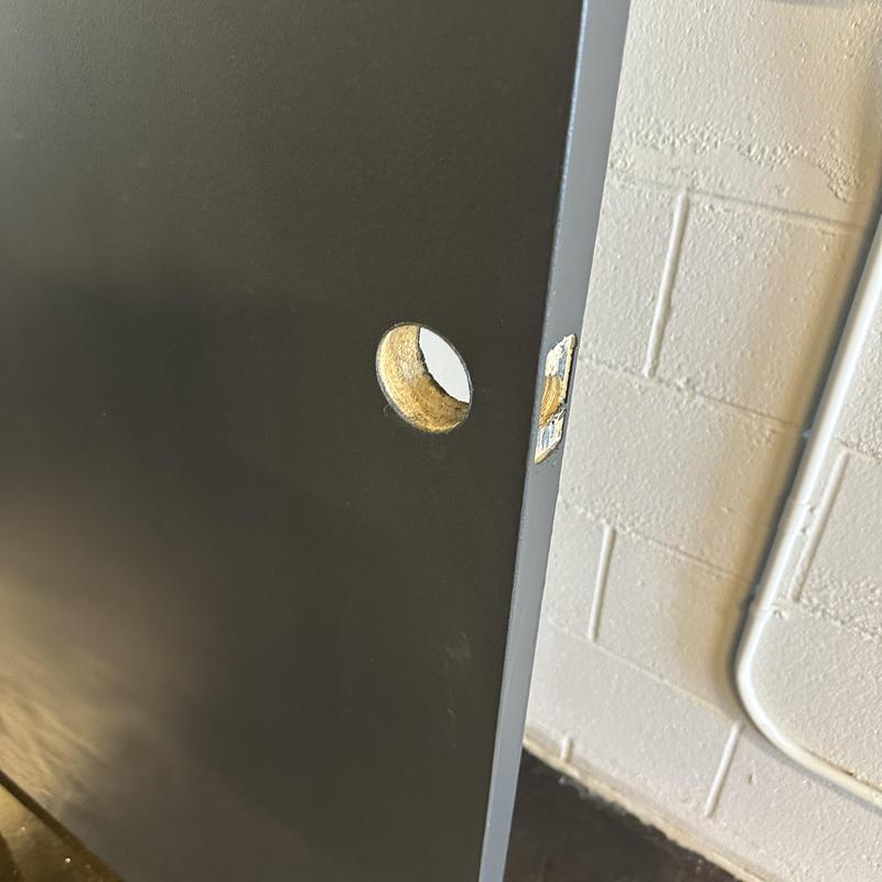 Commercial door lock holes drilled for installation