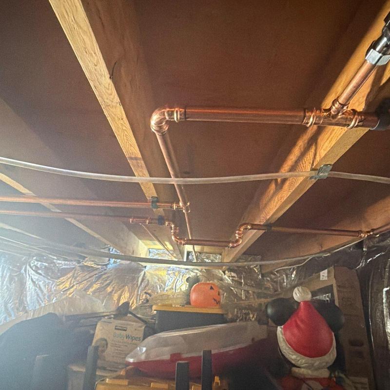 Copper type L water piping installed in basement ceiling Copper type L water piping installed in basement ceiling