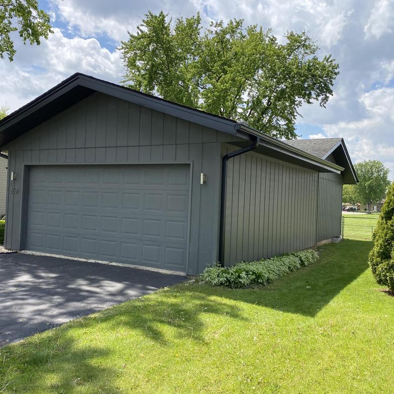 Gutter and fascia system on gray garage exterior Gutter and fascia system on gray garage exterior