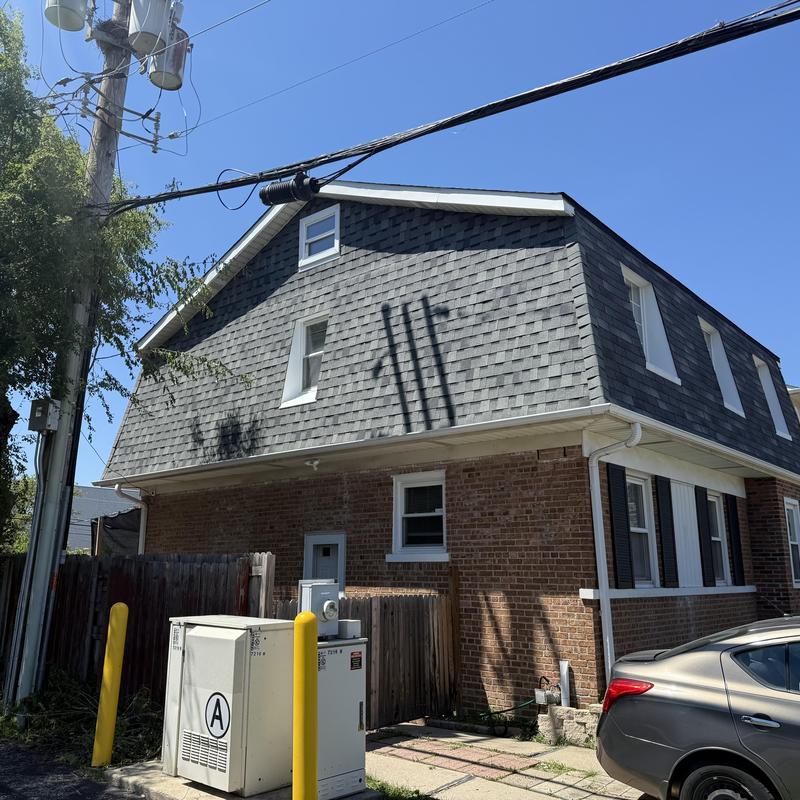 Atlas Pinnacle Pristine asphalt roof on brick house Atlas Pinnacle Pristine asphalt roof on brick house