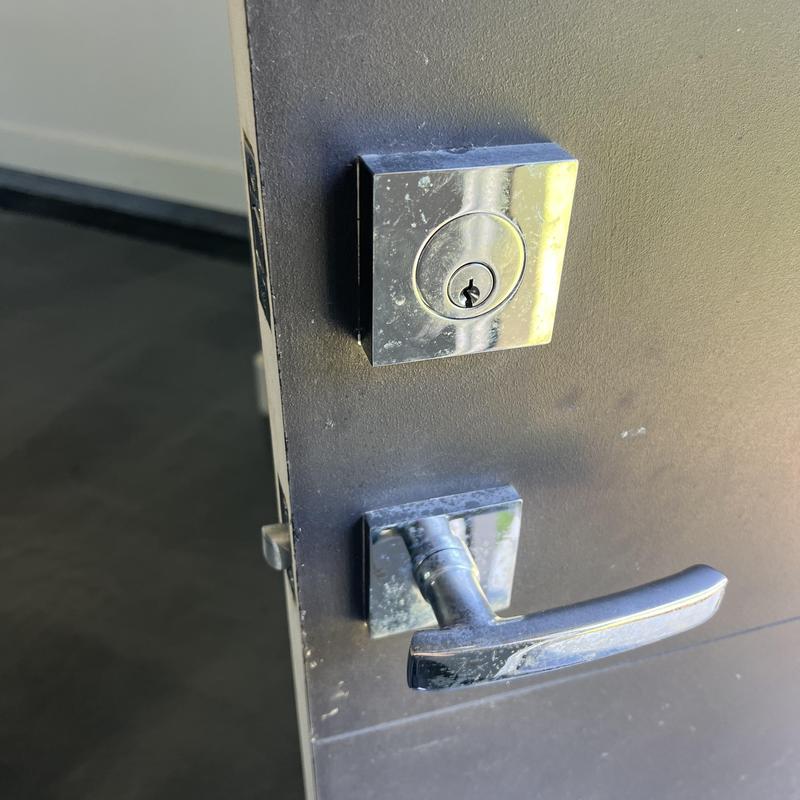 Door deadbolt and handle lock rekeying service