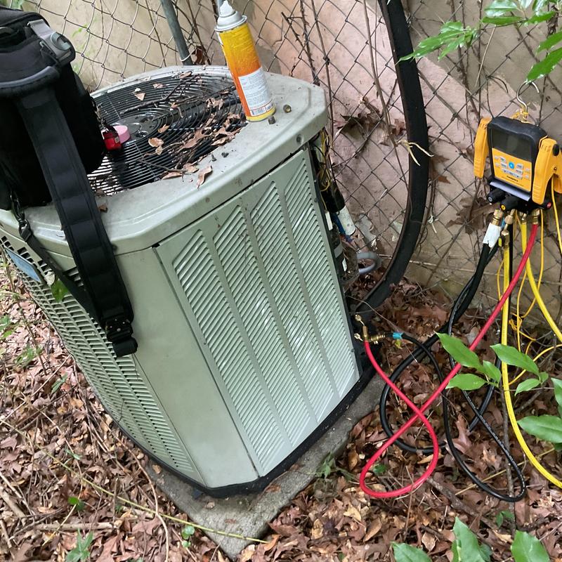 3 ton AC condenser with diagnostic gauges connected 3 ton AC condenser with diagnostic gauges connected