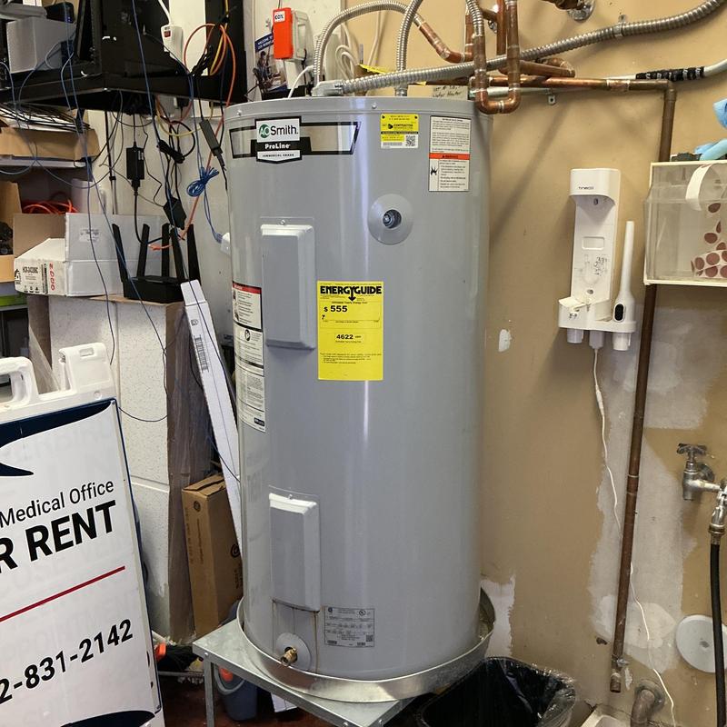 Water heater diagnostic and pipe connections in utility room