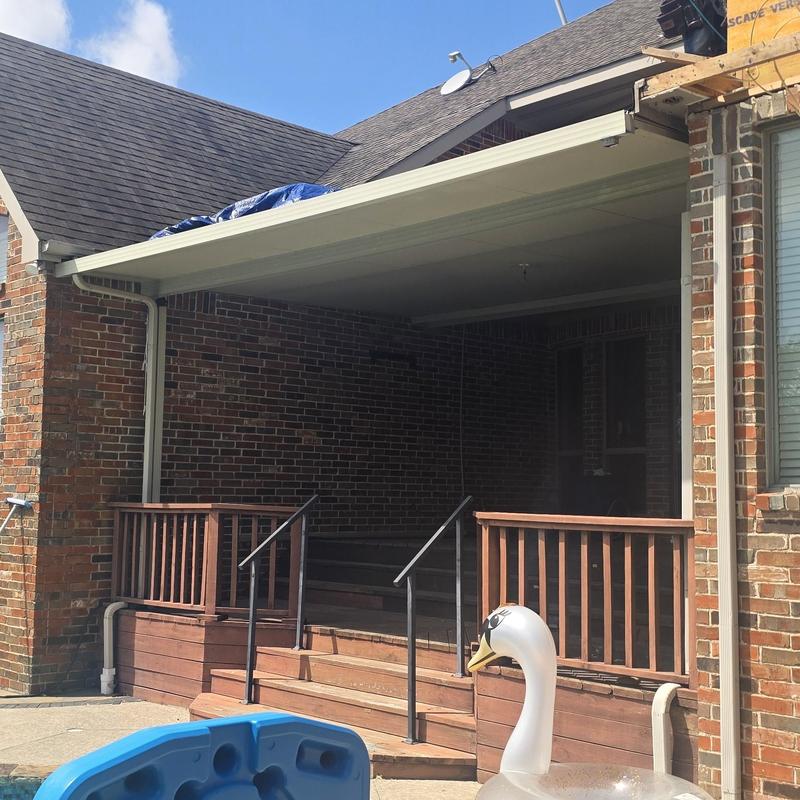 Roof shingles with hail damage and covered tarp in Terrell