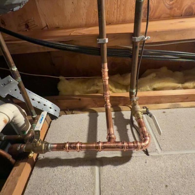 Copper repiping system under attic floor joists