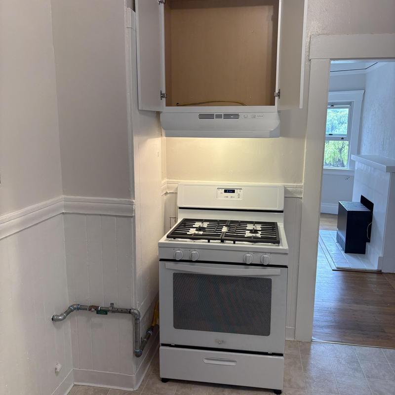 Gas line and stove installation with safety valve