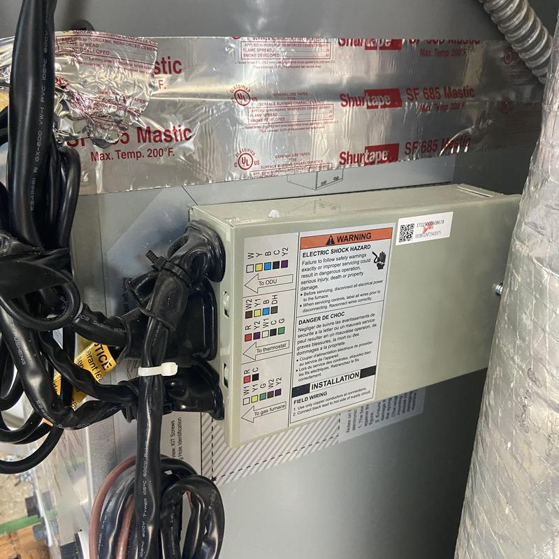 Electrical control box on HVAC coil unit
