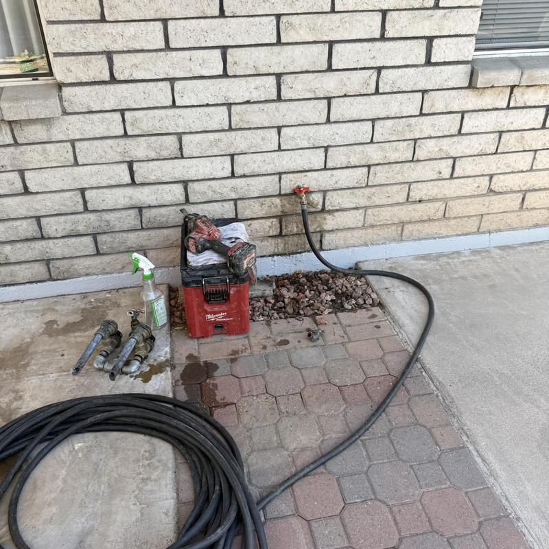 Outdoor hose bib water line extension setup
