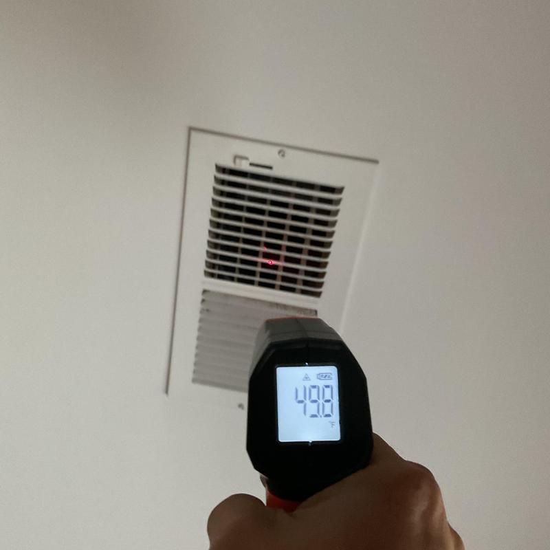 Air vent temperature check with infrared thermometer Air vent temperature check with infrared thermometer