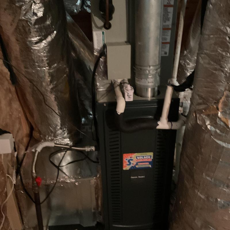 Furnace system with ductwork and insulation in utility room Furnace system with ductwork and insulation in utility room