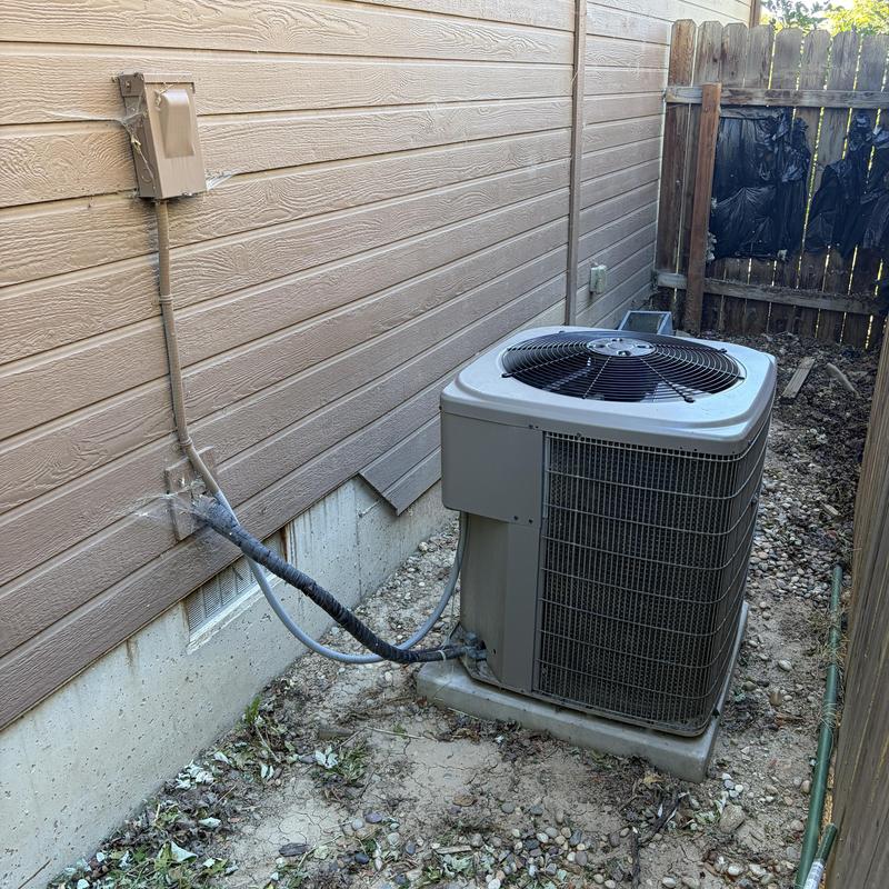 Air conditioner condenser coil and capacitor replacement outdoors