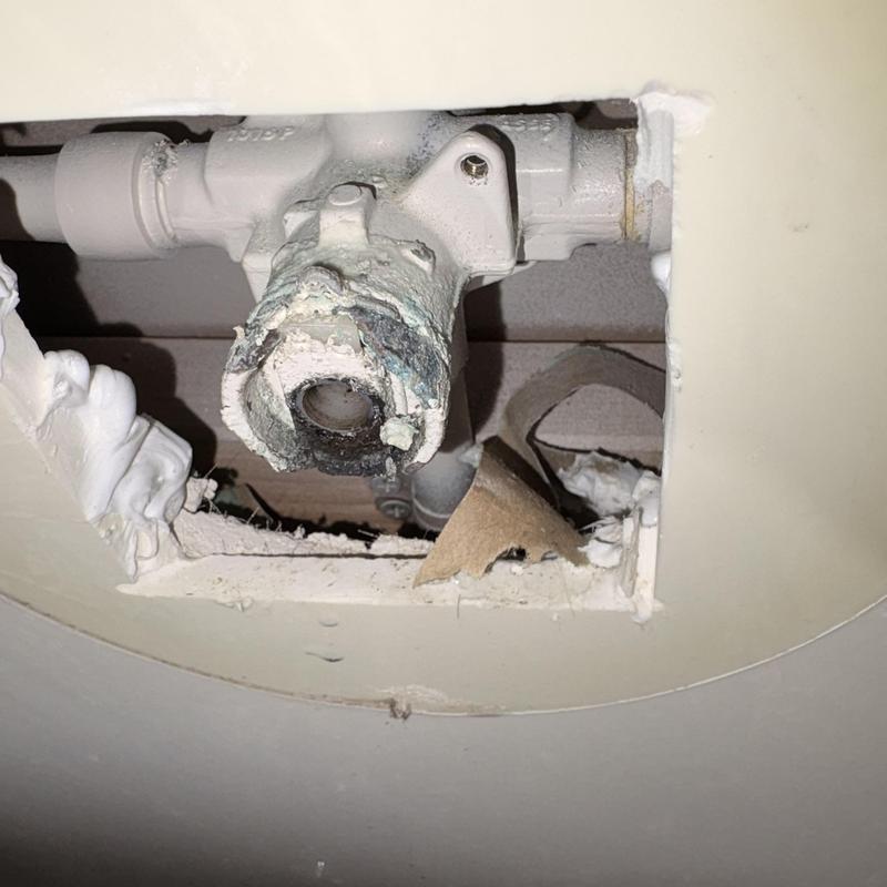 Moen positemp valve with corrosion buildup inside wall Moen positemp valve with corrosion buildup inside wall