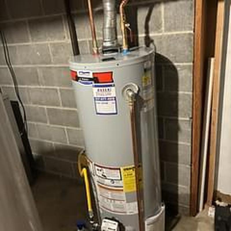 50 gallon gas water heater with copper piping installed