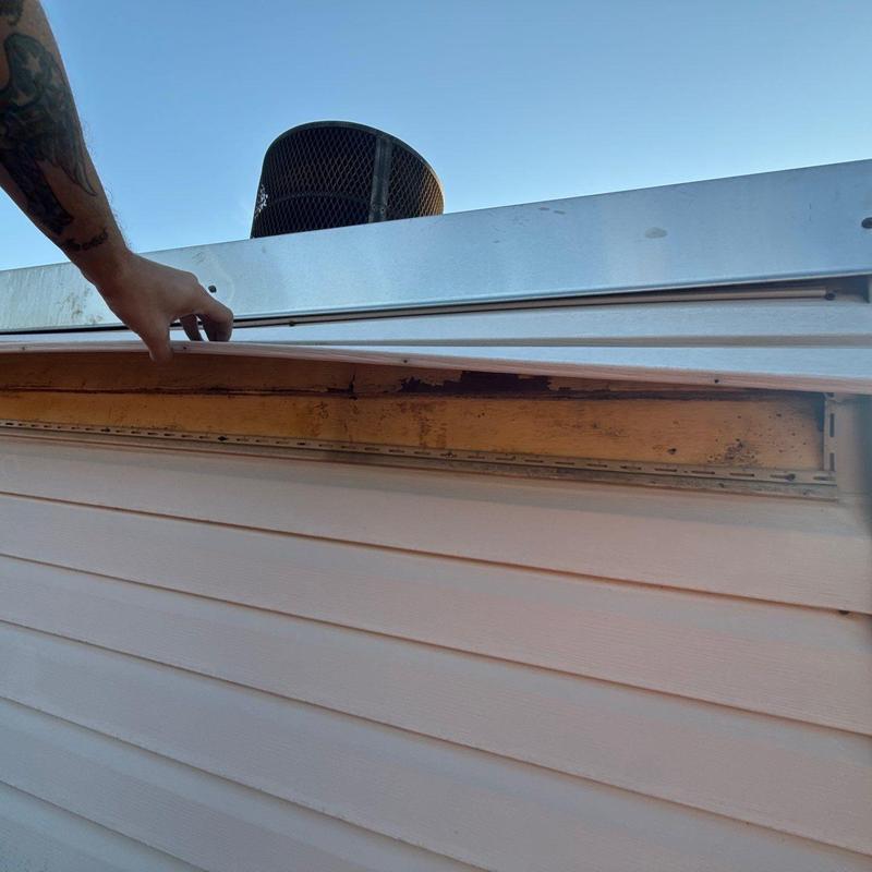 Fascia trim with wood rot and moisture damage Fascia trim with wood rot and moisture damage