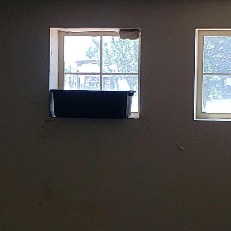 EPDM roof leak above window with water catch basin EPDM roof leak above window with water catch basin