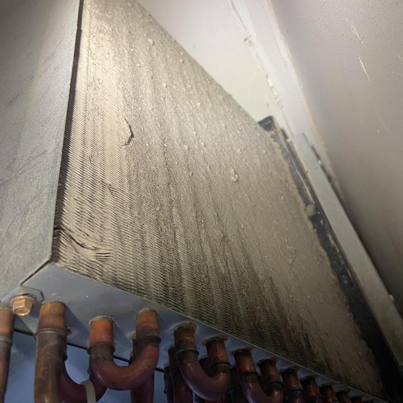Air conditioner evaporator coil heavily clogged with dust