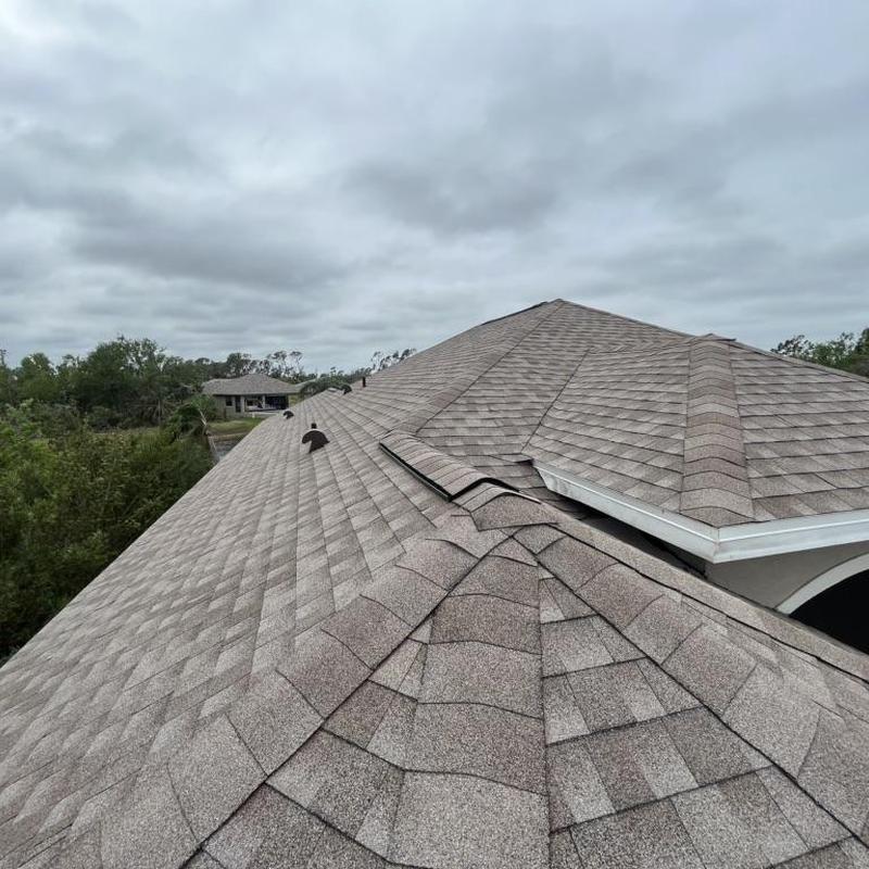 Architectural shingle roof with continuous ridge vents Architectural shingle roof with continuous ridge vents