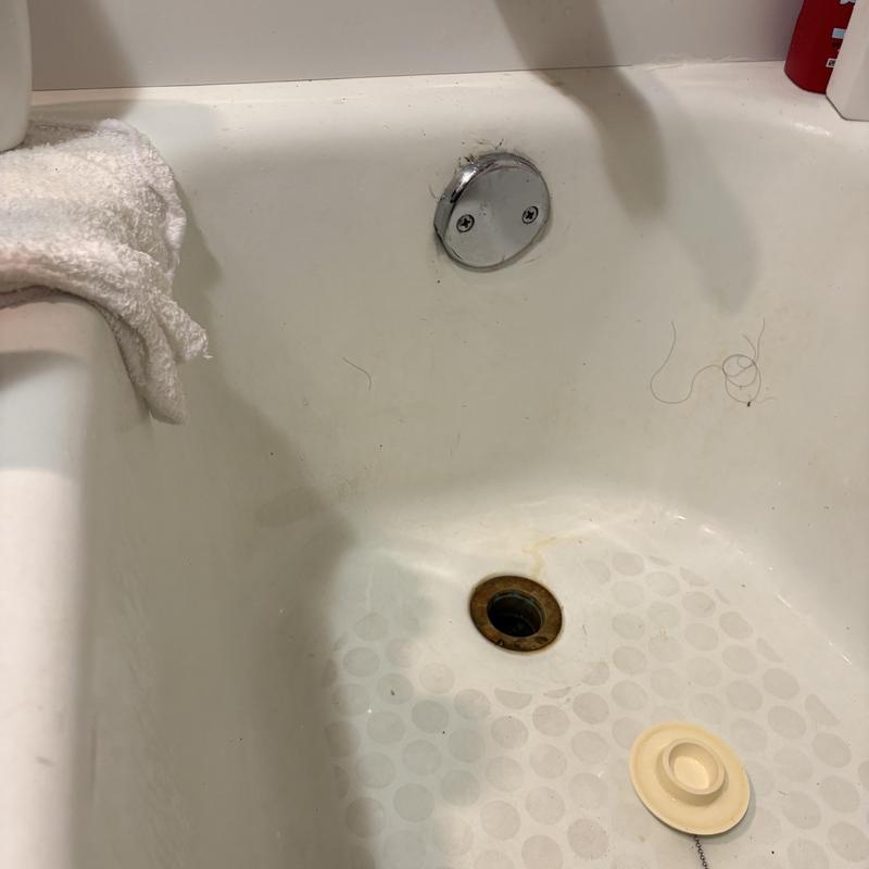 Cosmetic tub drain with hair tie clog removal Cosmetic tub drain with hair tie clog removal