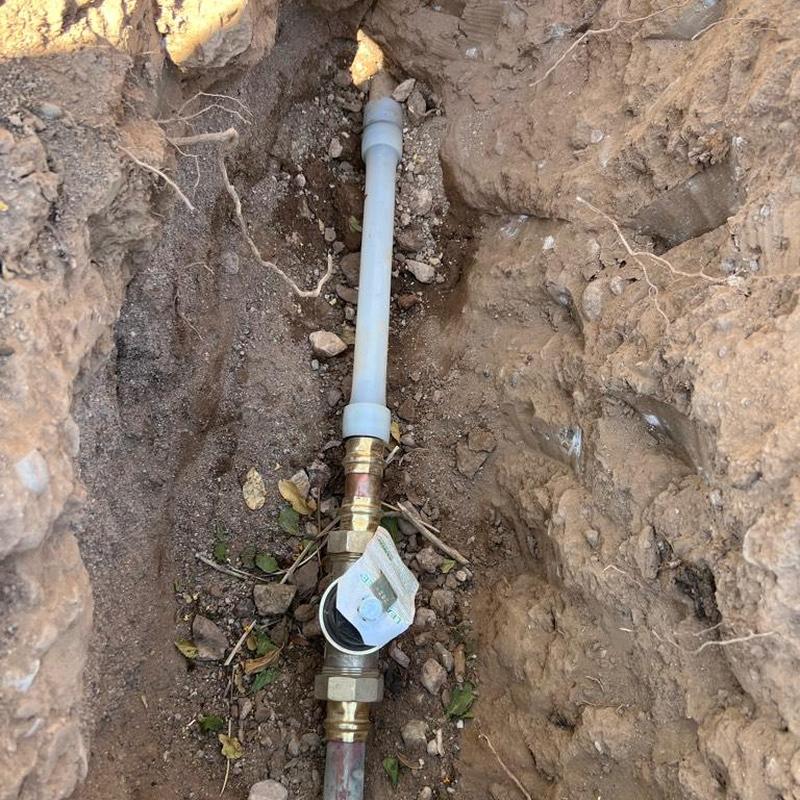 Pressure-reducing valve (PRV) installed in buried pipe trench