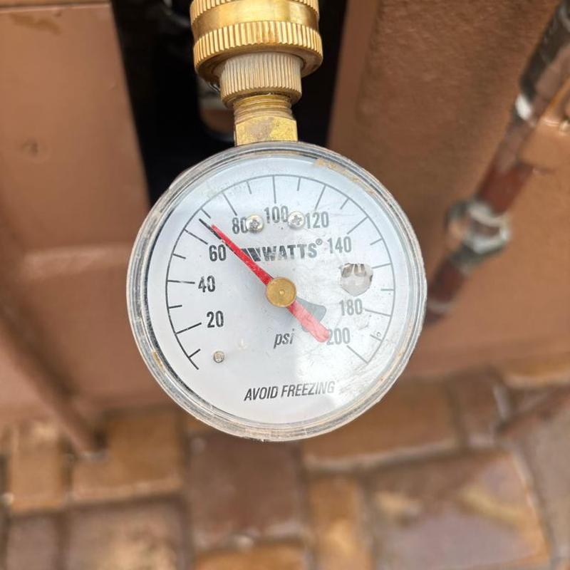Pressure relief valve gauge showing 68 psi in tan box