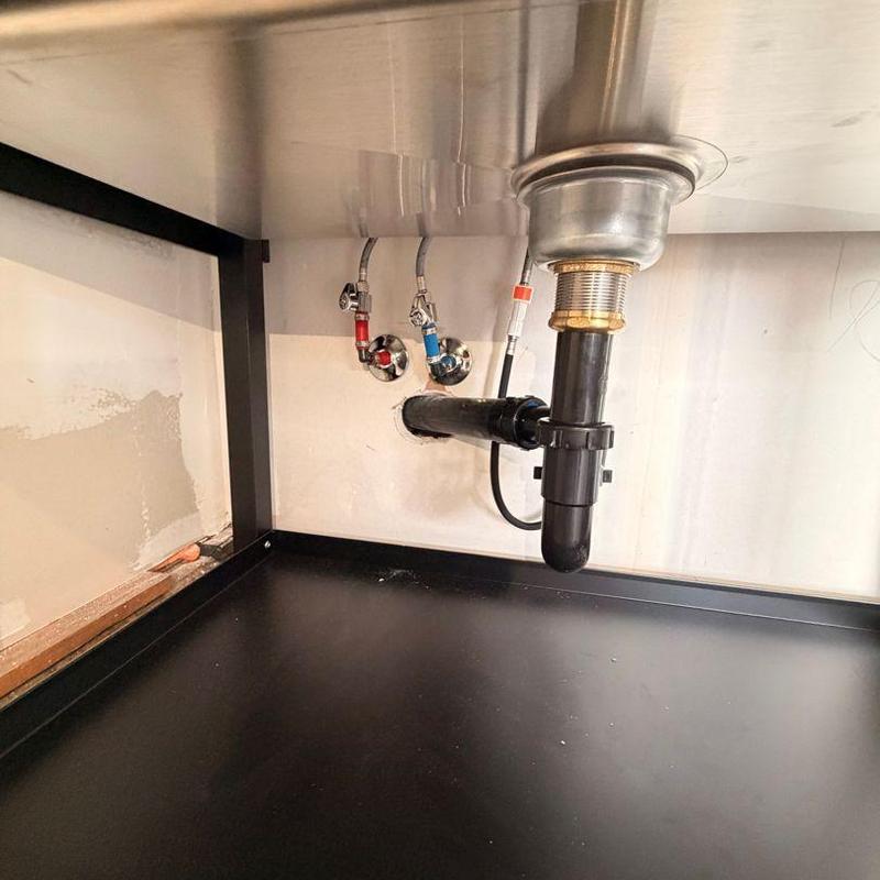 Utility sink plumbing with PEX lines and drain connections Utility sink plumbing with PEX lines and drain connections