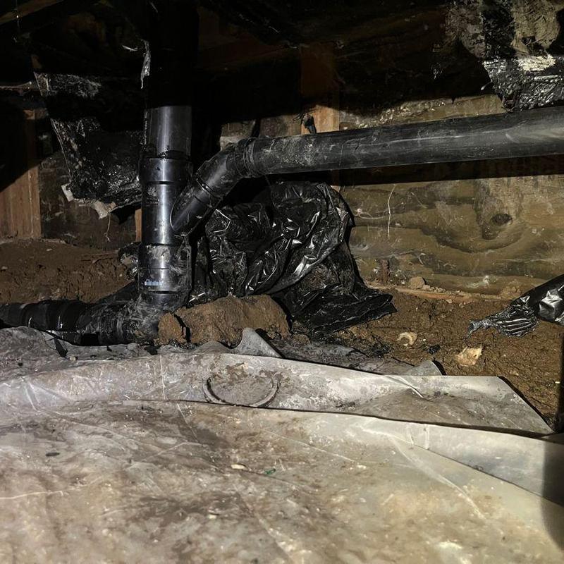 3-inch ABS drain pipe with fittings in crawl space 3-inch ABS drain pipe with fittings in crawl space