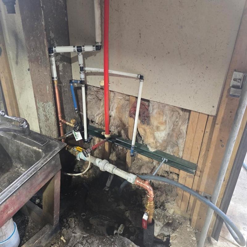 Water line distribution and trip waste piping installation