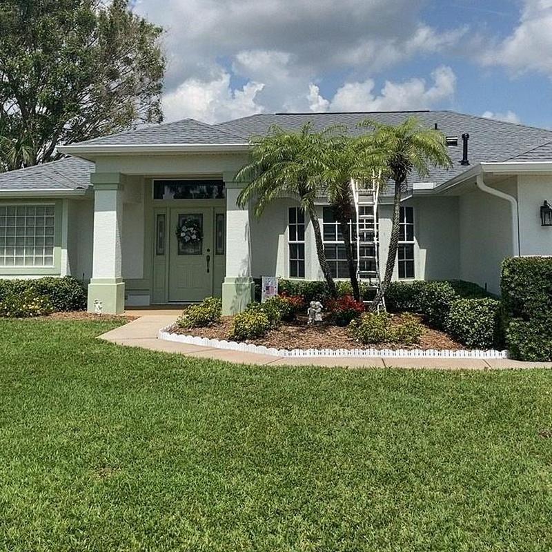 Architectural shingle roof on residential home in Florida Architectural shingle roof on residential home in Florida