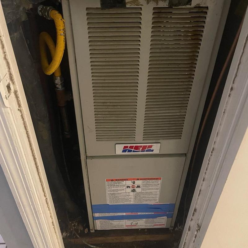 Gas furnace unit in residential closet, Tallahassee FL Gas furnace unit in residential closet, Tallahassee FL