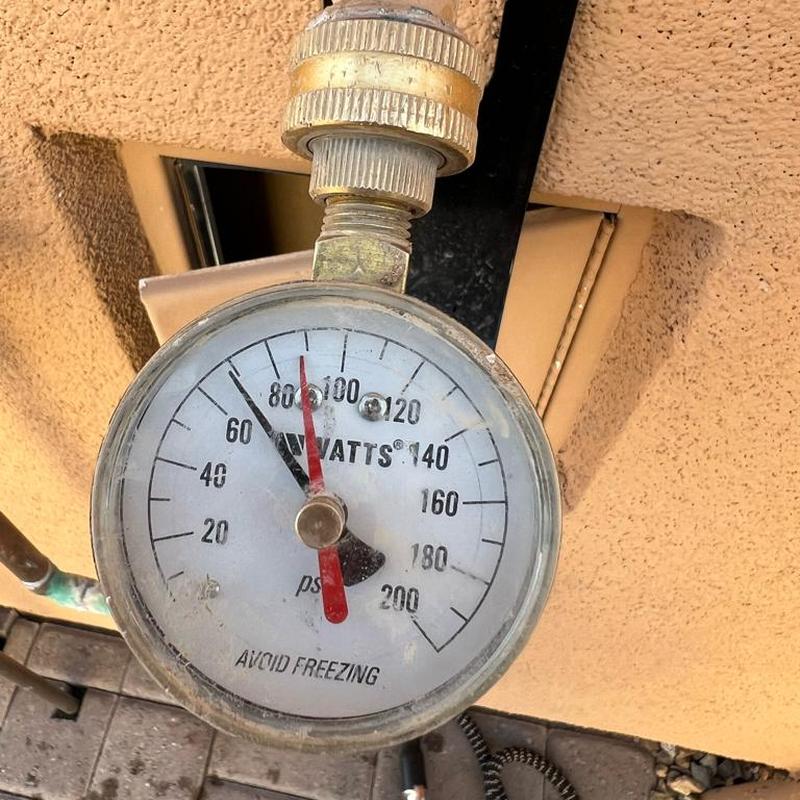 Pressure reducing valve with pressure gauge reading 68 PSI