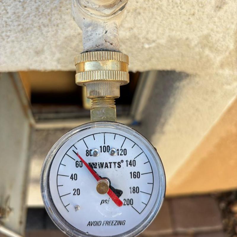 Pressure relief valve gauge measuring 70 psi