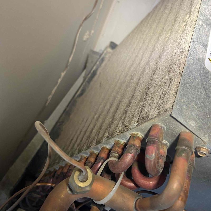 Mini split evaporator coil with copper tubing buildup