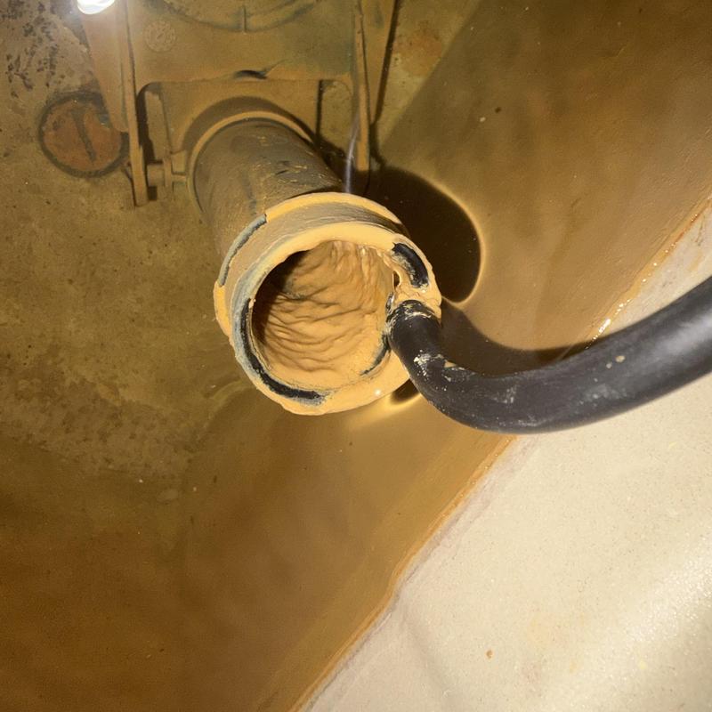 Well drop pipe with heavy sediment buildup Well drop pipe with heavy sediment buildup