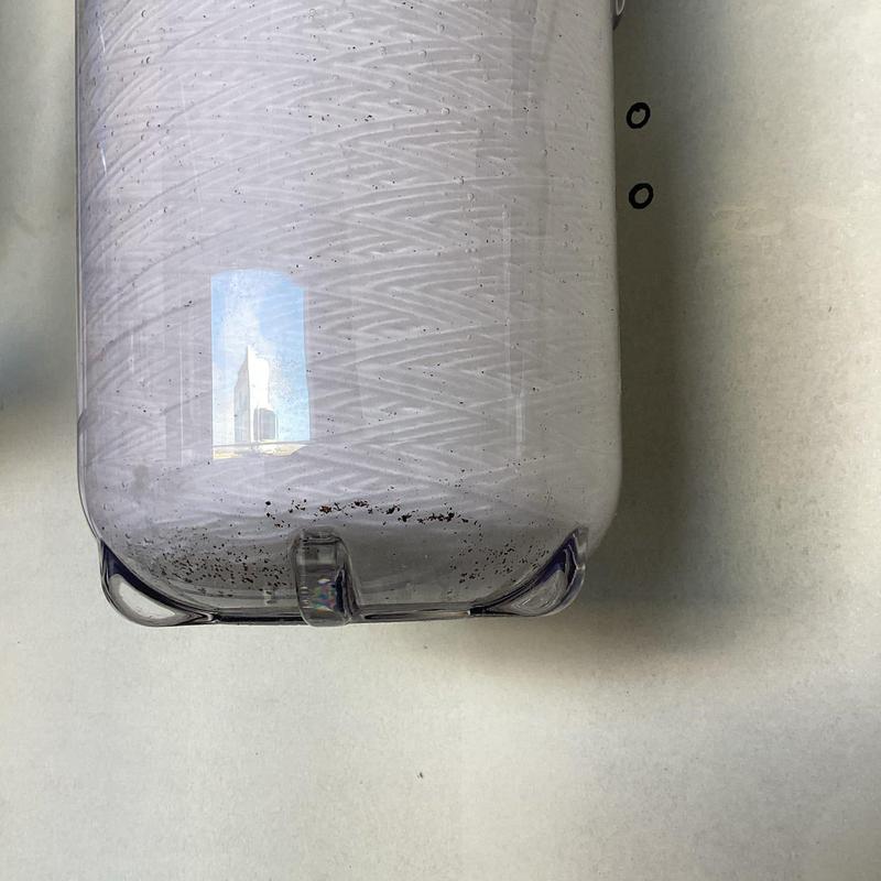 Whole house water filter housing with sediment buildup