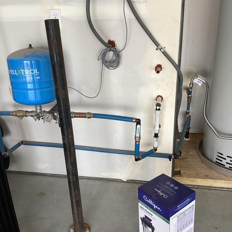 Whole house water filter installation on pipe loop