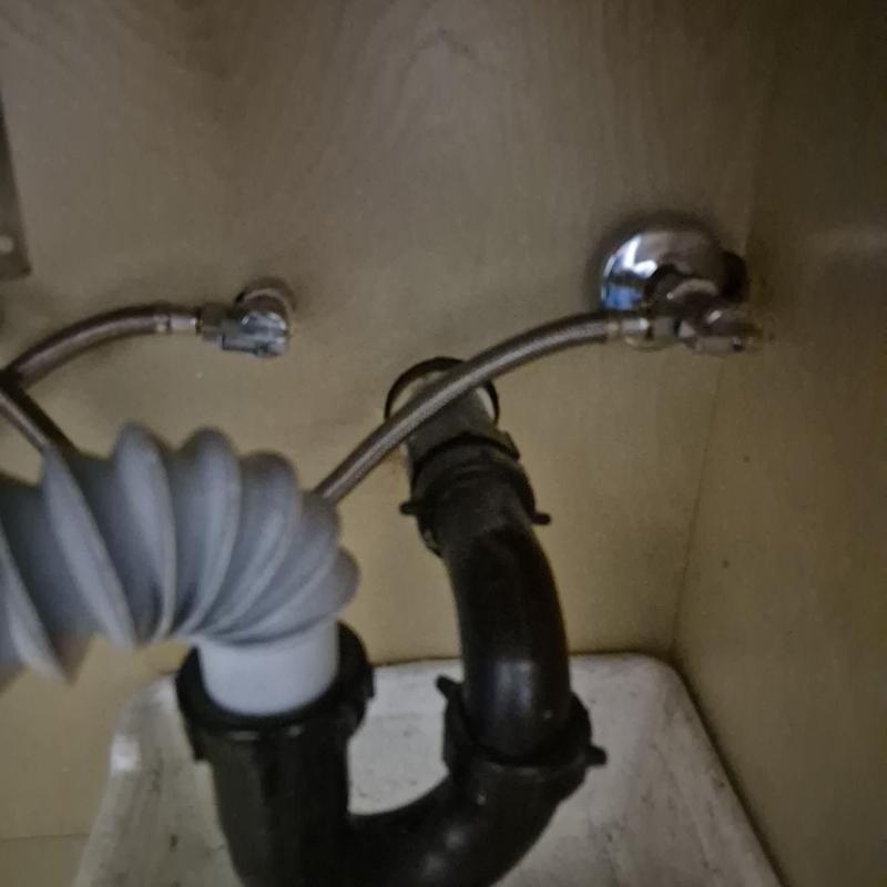 Delta 14 turn lav faucet supply lines and P-trap under sink