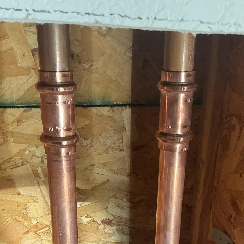 Copper water supply pipes with press fittings installed