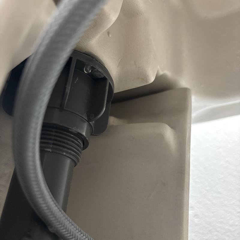 Pop-up assembly under pedestal sink with hose connection