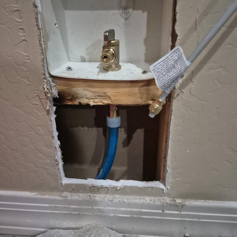 Ice maker valve and water line installation in wall cavity